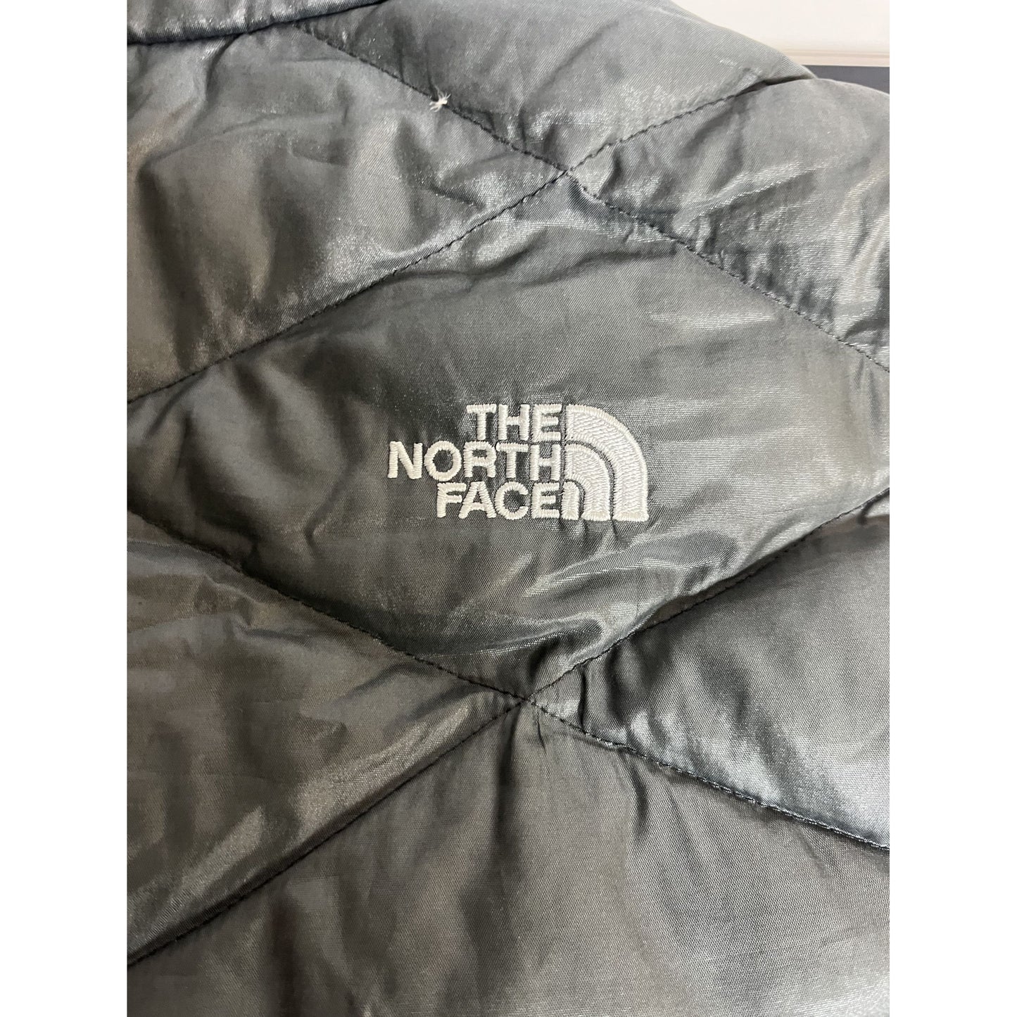 Gilet matelassé isolant en duvet 550 noir The North Face pour femme