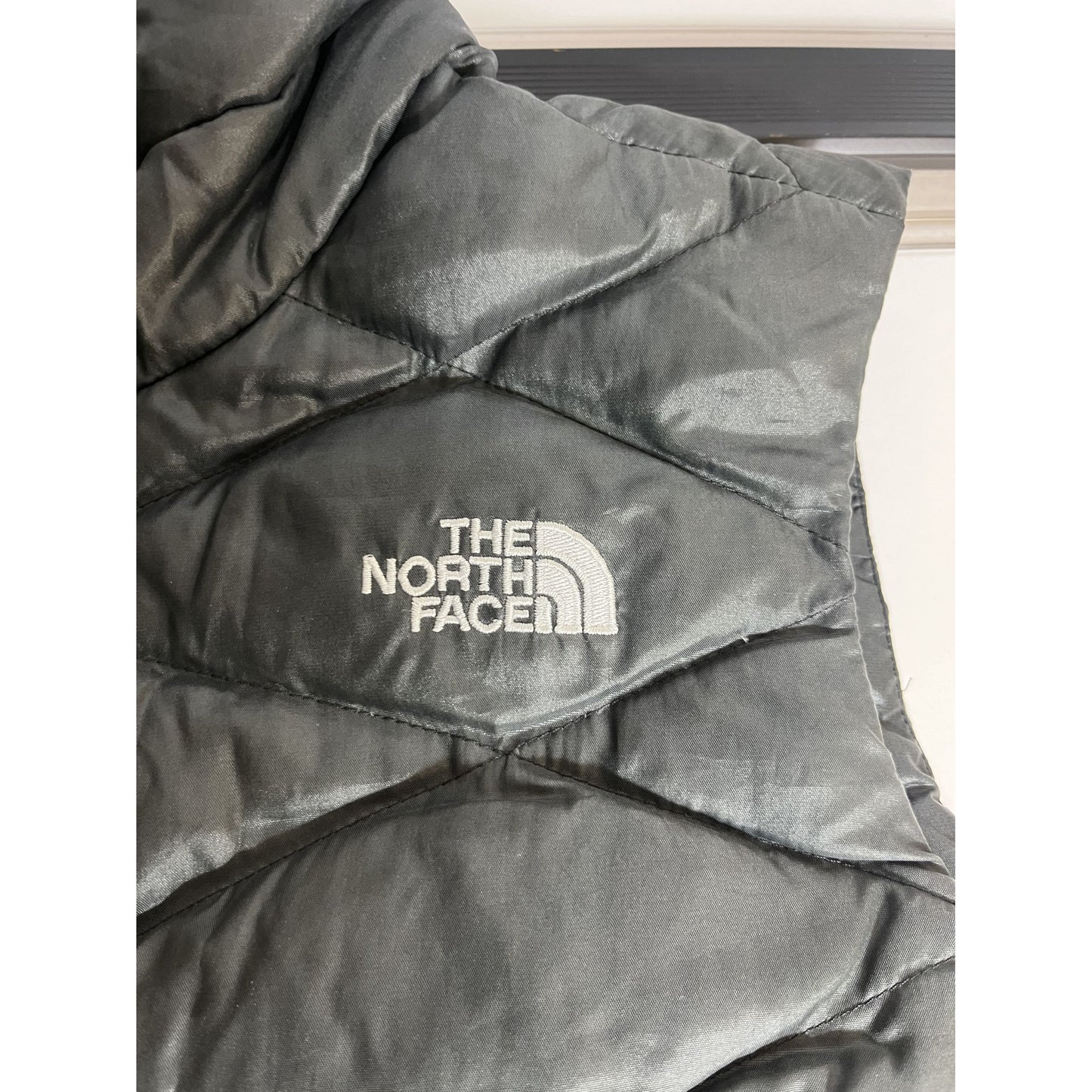 Gilet matelassé isolant en duvet 550 noir The North Face pour femme