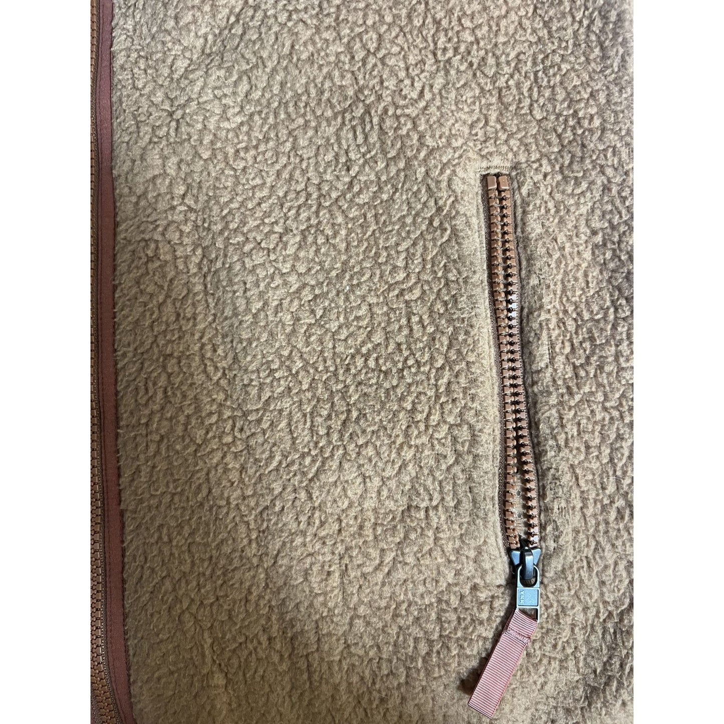 Gilet polaire sans manches Patagonia pour homme, couleur beige, avec poches zippées et col montant