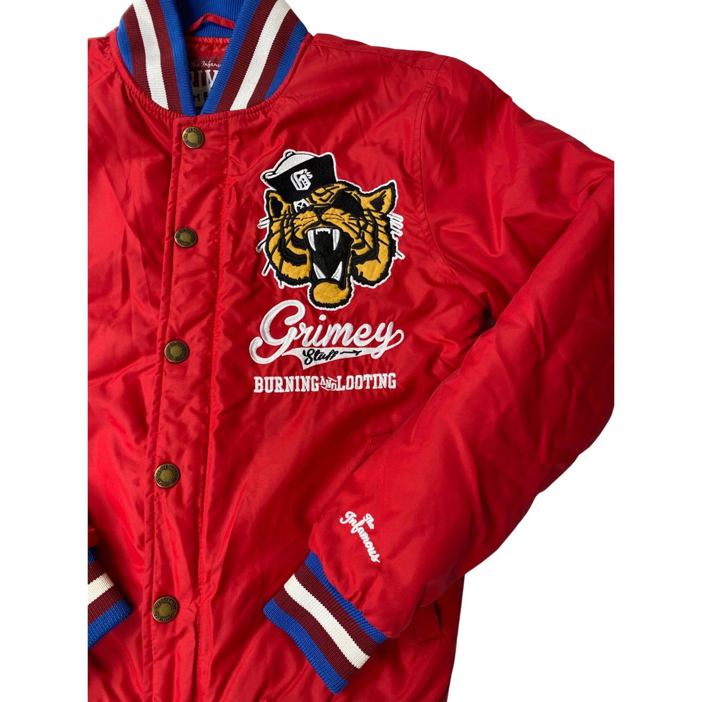 Blouson aviateur rouge avec logo tigre brodé et patch