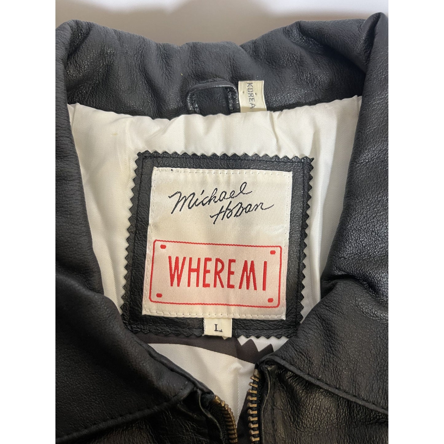 Veste en cuir Michael Hoban Wheremi, grande taille, noire et bleu sarcelle, motif zigzag